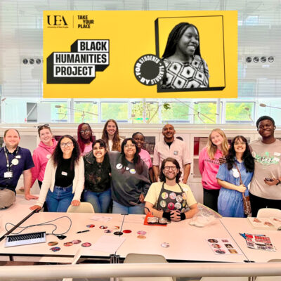 Ben and a group of young people at a badge table as part of the University of East Anglia Black Humanities Project