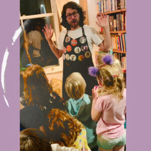 Ben with a group of children at a birthday party