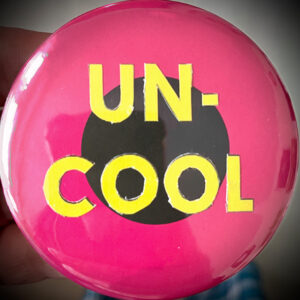 Badge collage by Ben with the word UNCOOL in big yellow letters against a pink background